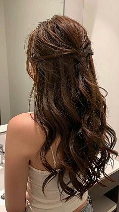 Twisted Half Up Wedding Hairstyle With Loose Curls