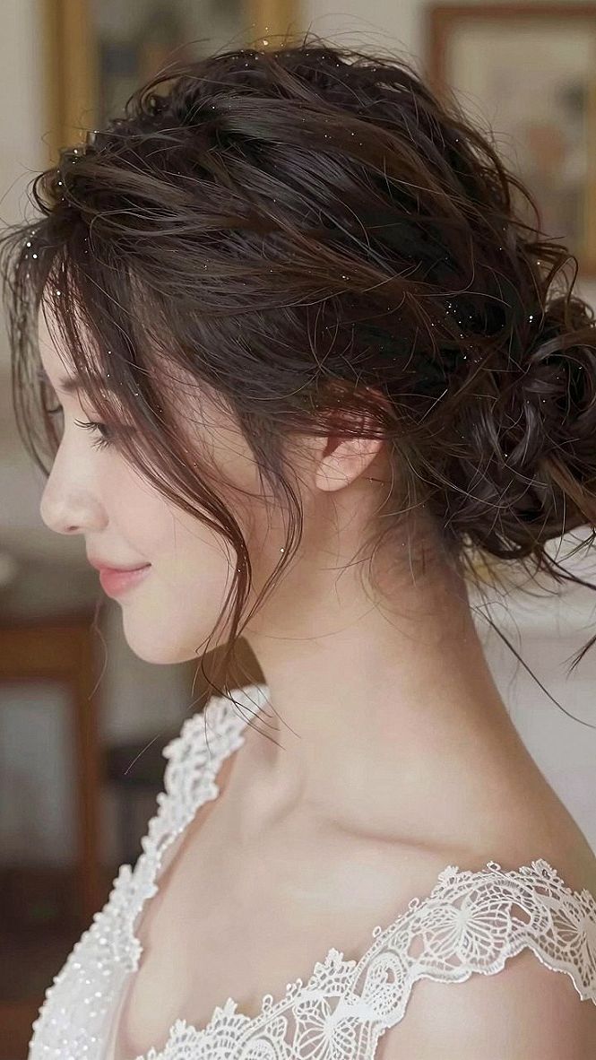 Textured Low Bun With Soft Front Wisps