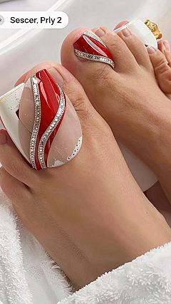 Adding Sparkling Rhinestones to Burgundy Gel Pedicures