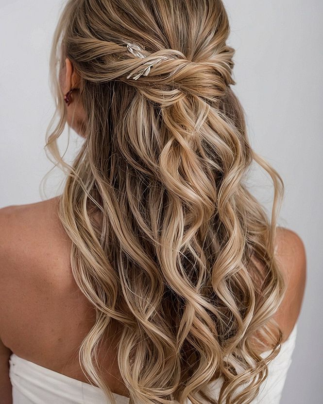 Choosing A Twisted Half Up Wedding Hairstyle With Pins