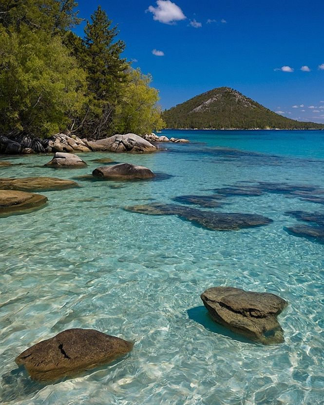 Selecting Rocky Shores and Clear Water Coves for Your Travel Itinerary