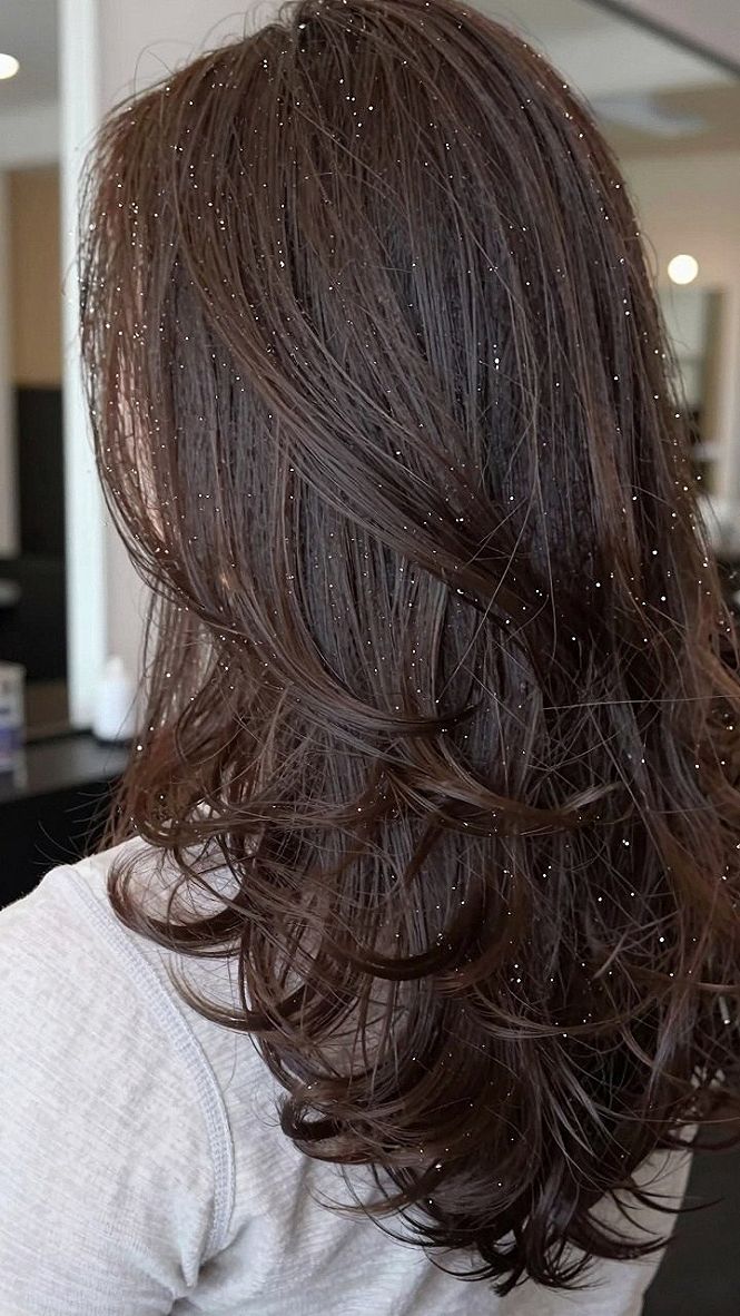 Choosing Hair Tinsel With Layered Cuts And Curtain Bangs