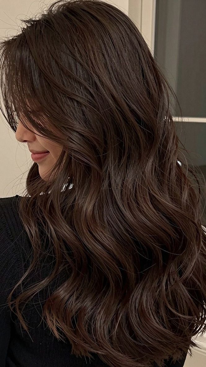 Choosing Glossy Cool Dark Brown Hair With Subtle Waves