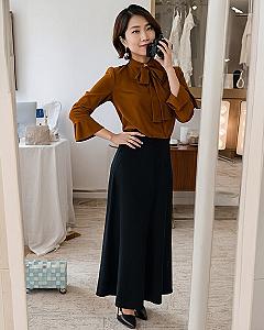 Pairing Brown Trousers With A Pussy Bow Blouse
