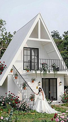 Maintaining White A-Frame Cabins and Garden Borders