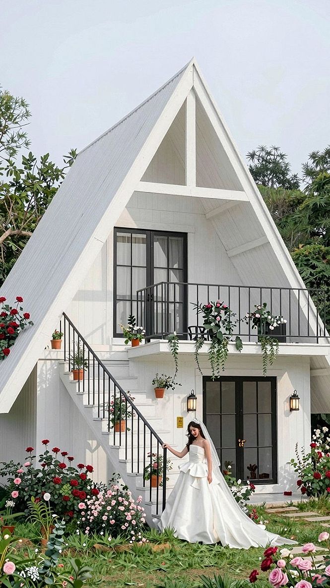 Maintaining White A-Frame Cabins and Garden Borders
