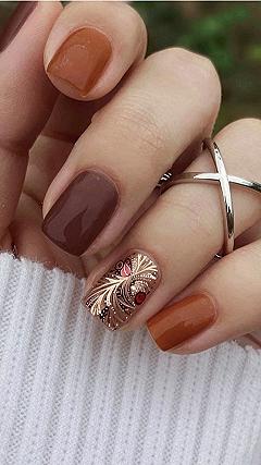 Applying Intricate Metallic Foil And Amber Tones