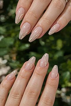 Dreamy Nude & Gold Swirl Nails for a Chic Look