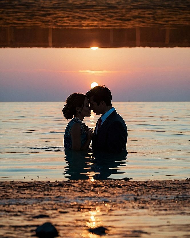 Capturing Romantic Sunset Silhouettes Along Coastal Waters