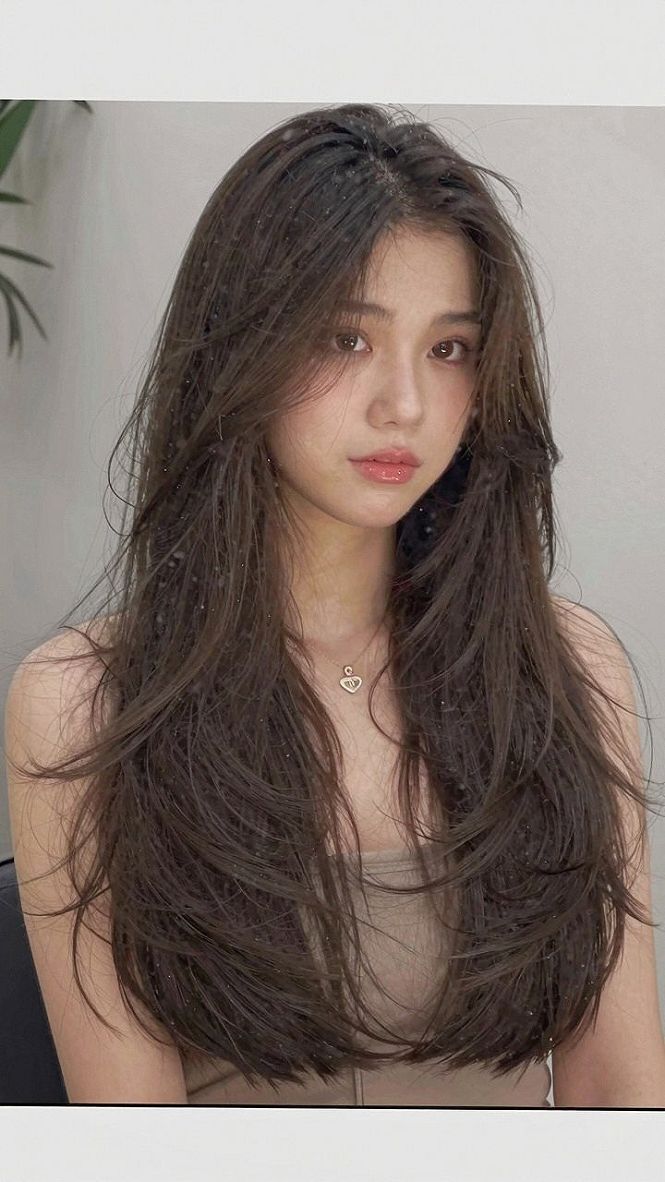 Styling Dark Layered Hair With Soft Fringe Elements