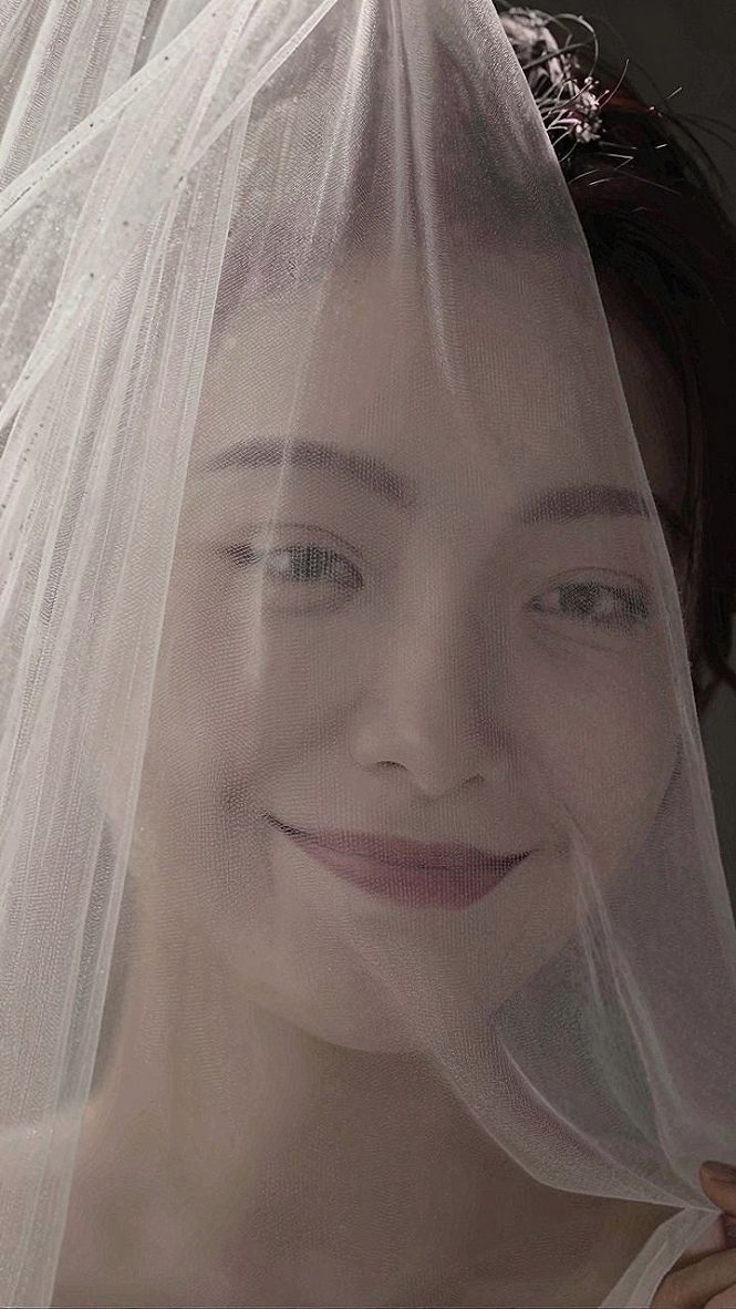 Adding a Sheer Tulle Veil to Your Strapless Wedding Gown