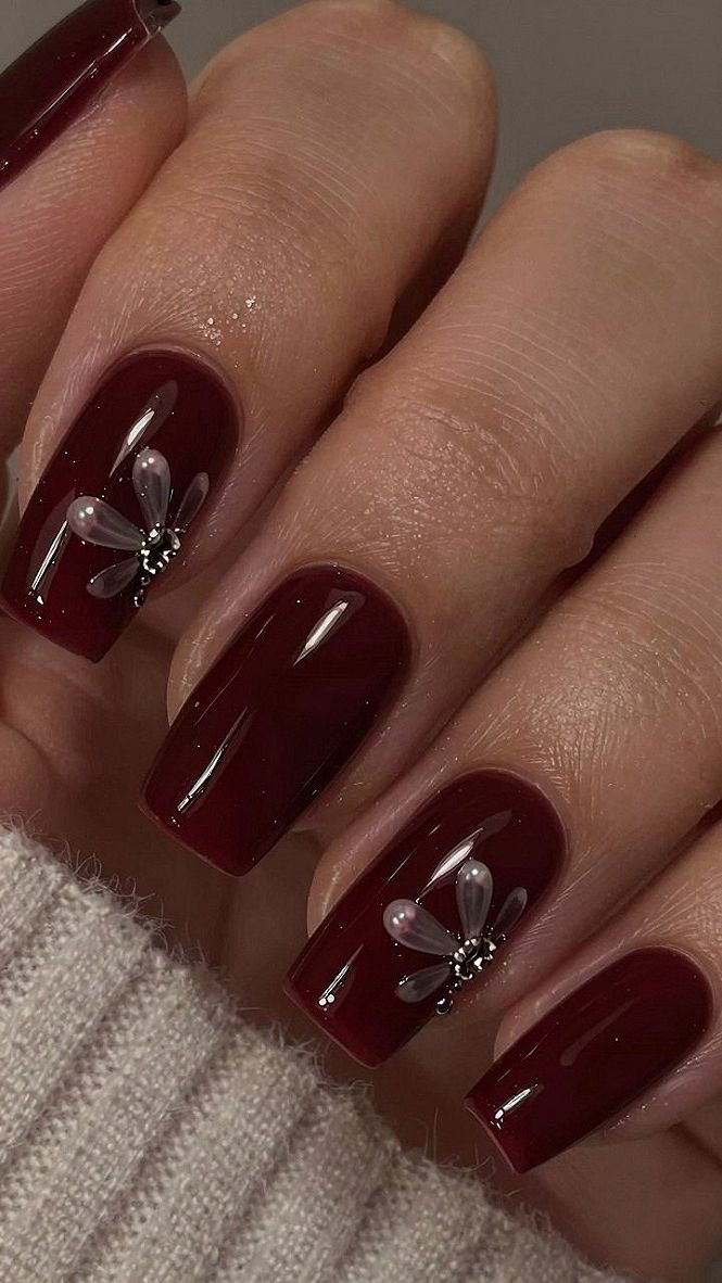 Deep Burgundy Pedicures With Delicate Floral Nail Art