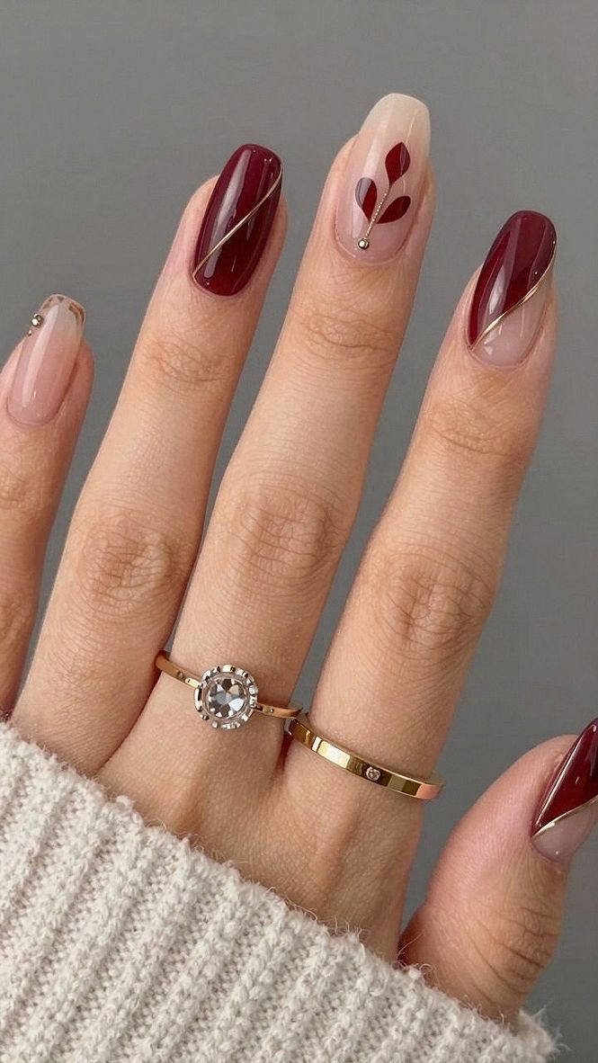 Deep Burgundy Pedicures Paired With Delicate Gold Accents