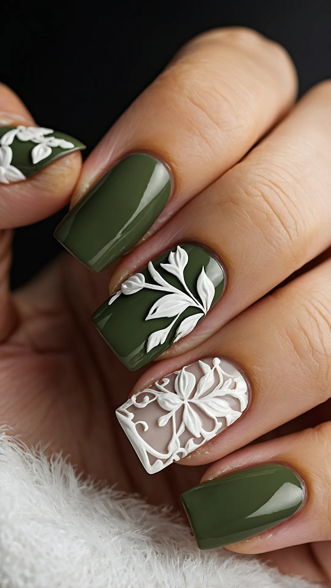 <p>These nails are practically screaming 'It's fall, witches!' in the best possible way. That deep, rich burgundy color is like taking all the cozy vibes of a pumpkin patch, a warm blanket, and a good spooky movie, then mashing them all into one perfect manicure. Forget changing leaves; these nails are the real sign that autumn has officially arrived. You just know these beauties are ready to perfectly accessorize your hot chocolate or help you scroll through endless Halloween costume ideas.</p><p>Plus, check out that snuggly sweater cuff and those sparkly rings peeking out! It's like this hand woke up, decided to be the most stylish ambassador for autumn, and totally nailed it (pun intended!). With a look this polished, you're not just ready for fall; you're basically *the* fall aesthetic personified. Who needs a whole outfit when your nails and a cozy sleeve are already serving up this much seasonal chic? These truly are the perfect 'fall nails' for flexing your autumn spirit, whether you're apple picking or just chilling at home.</p><figure class=