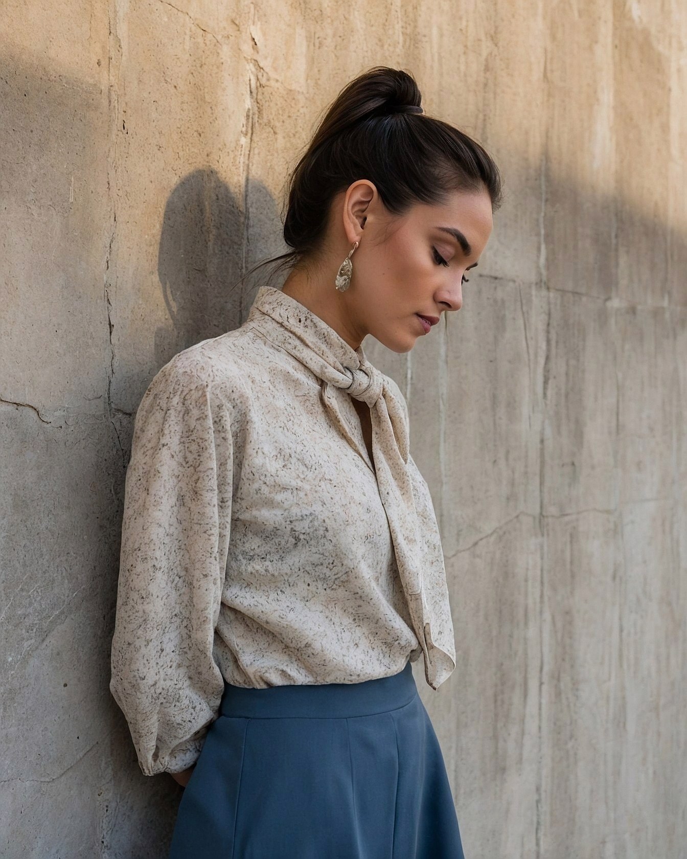 Textured Blouse and Blue Skirt Side Profile
