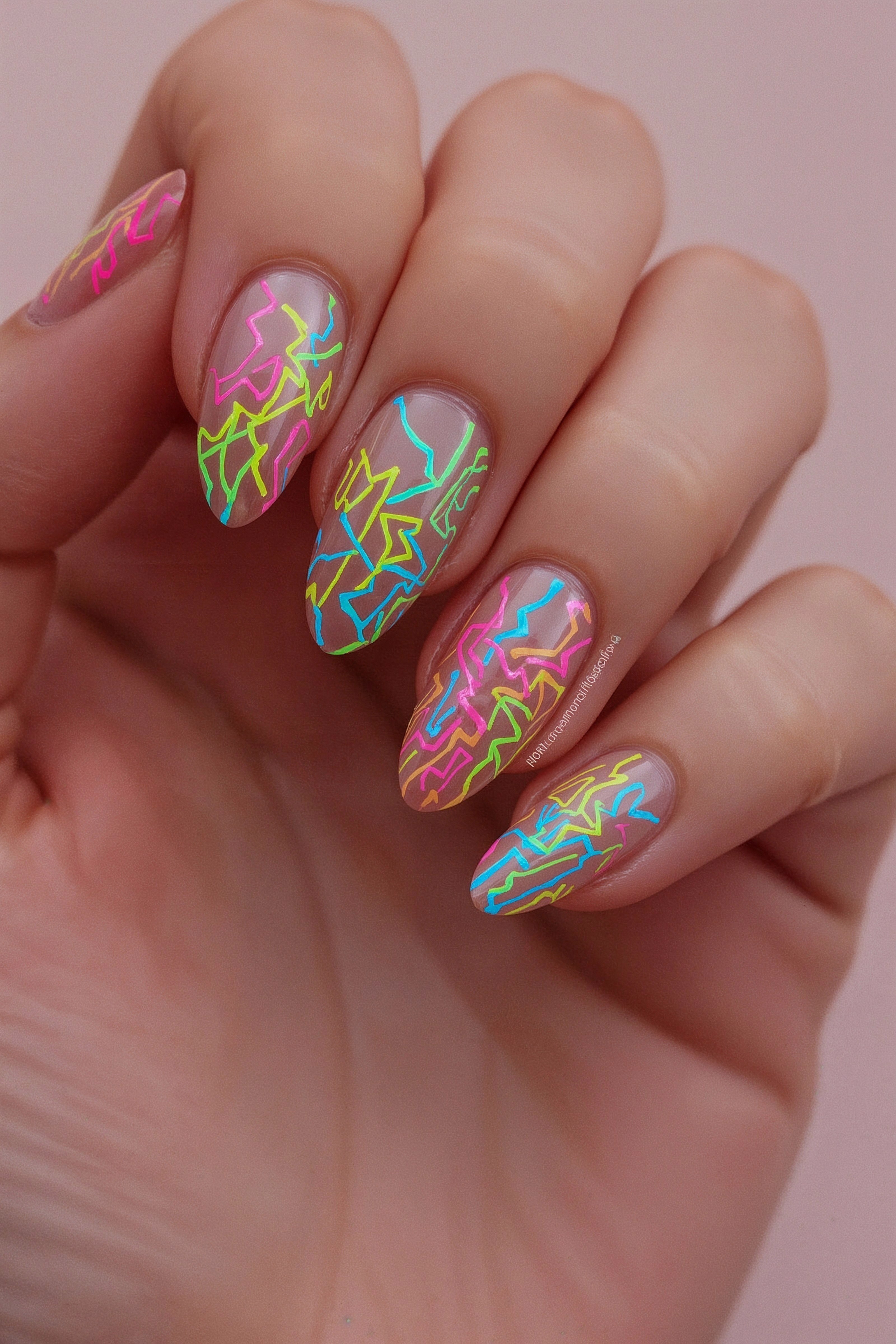 Neon Lines Adorn Almond-Shaped Nails