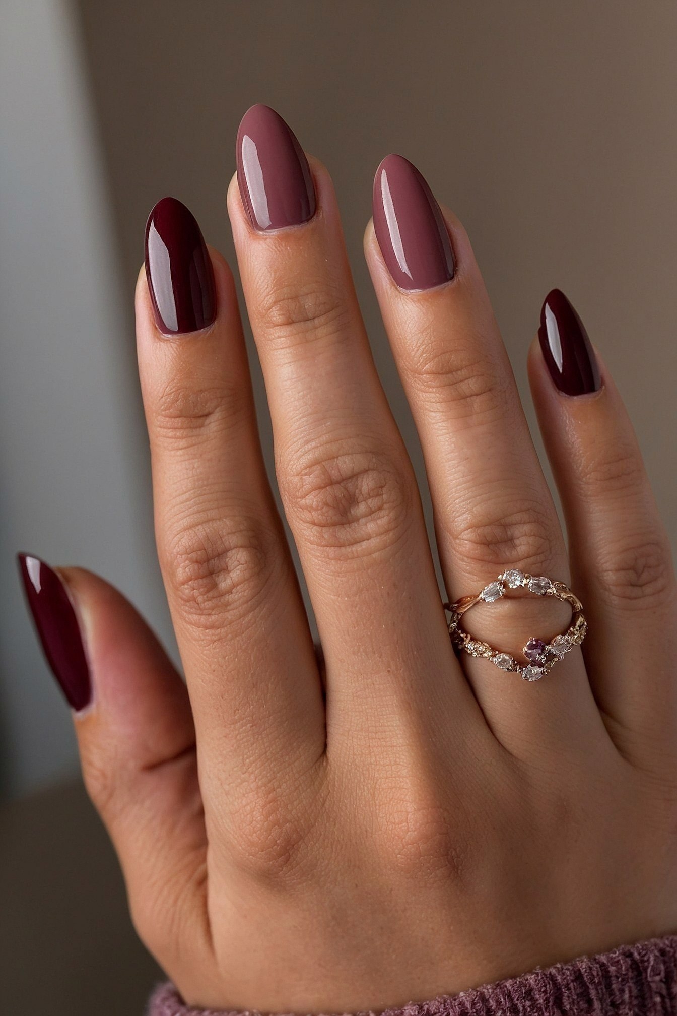 Close-up of Almond Nails with Ring Detail