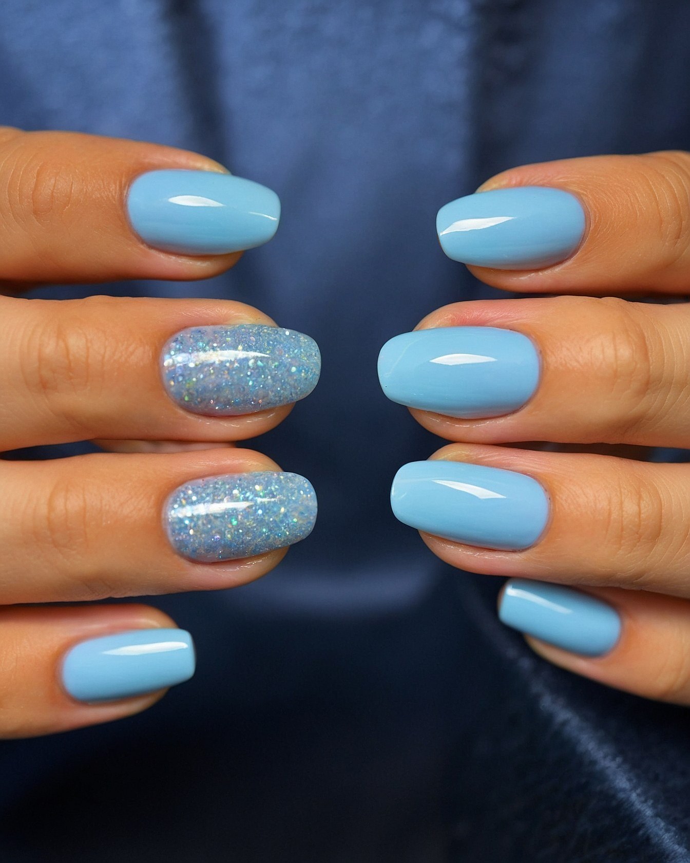 Soft Blue Nails with Shimmer Accents