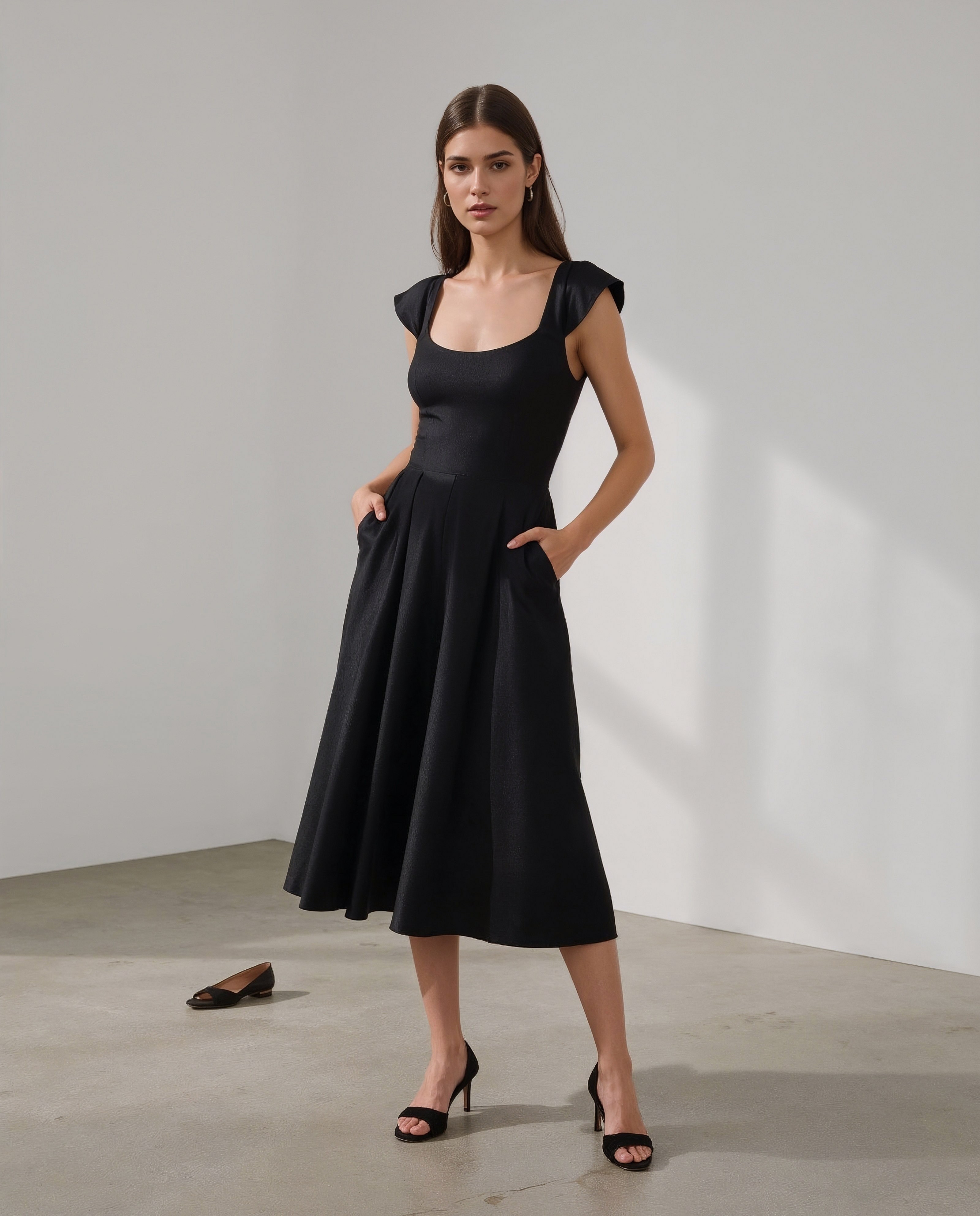 The Subtle Sheen of a Flared Midi Skirt