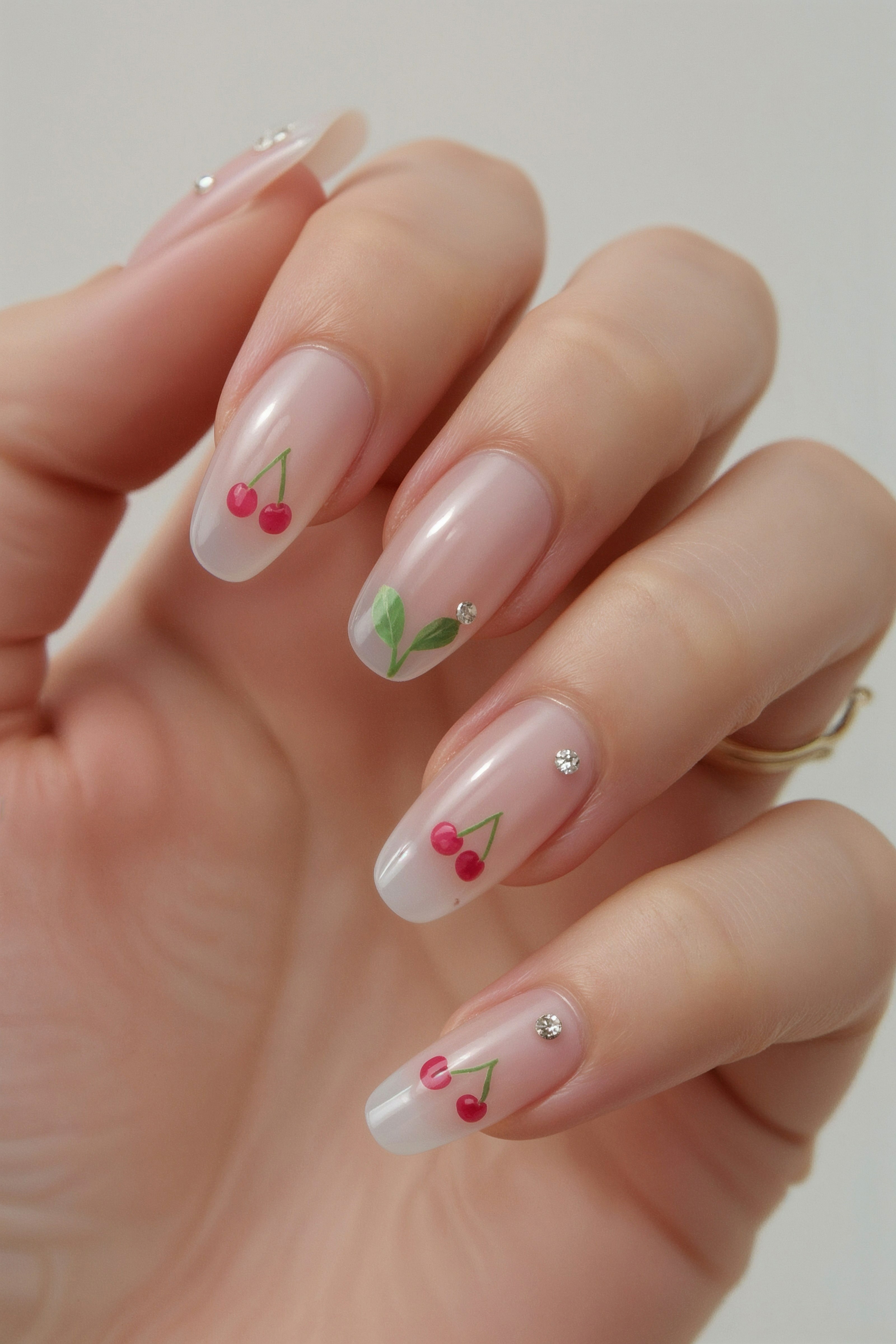 Sheer Nails Adorned with Delicate Cherries