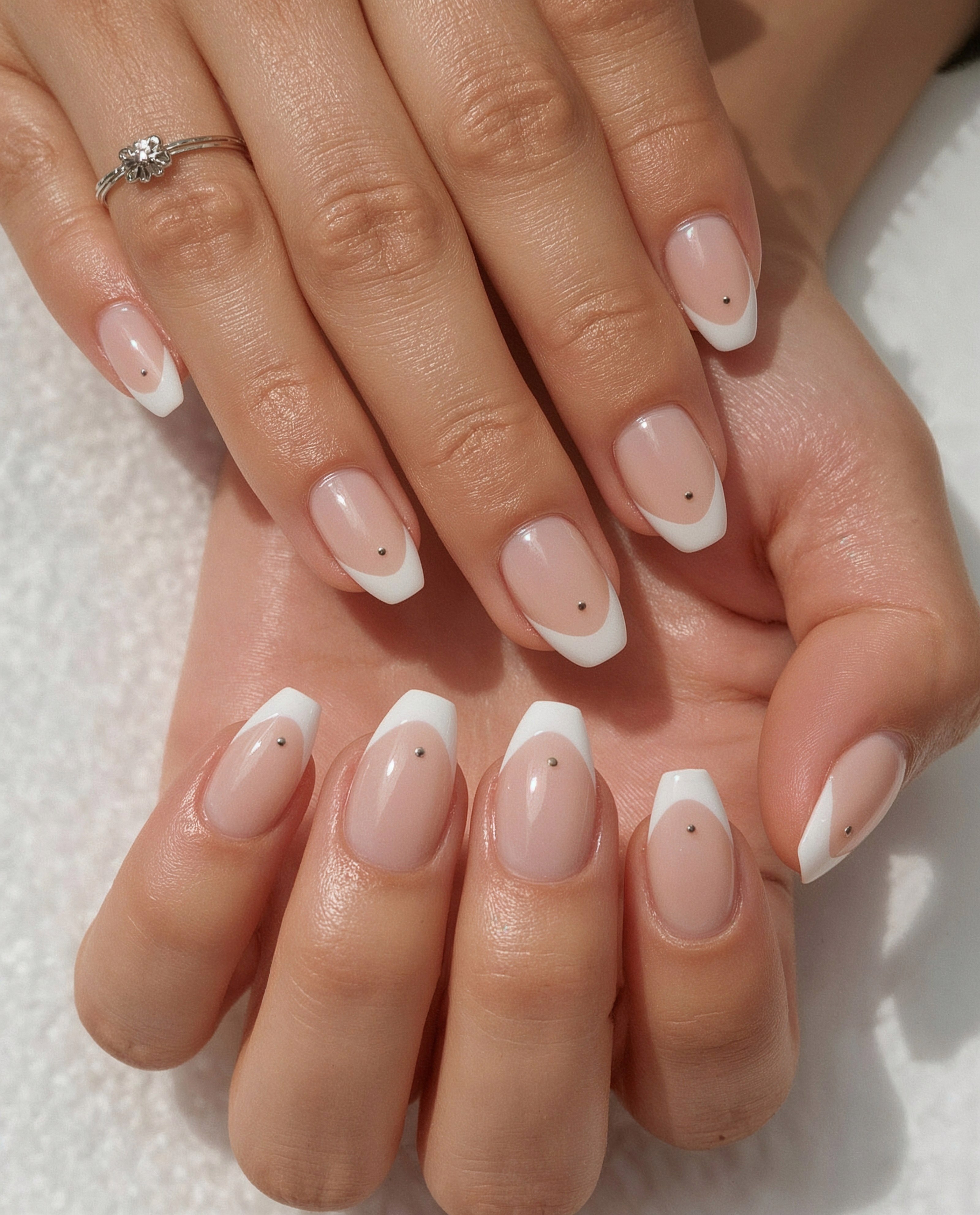 Almond French Tips with Subtle Dot Accent