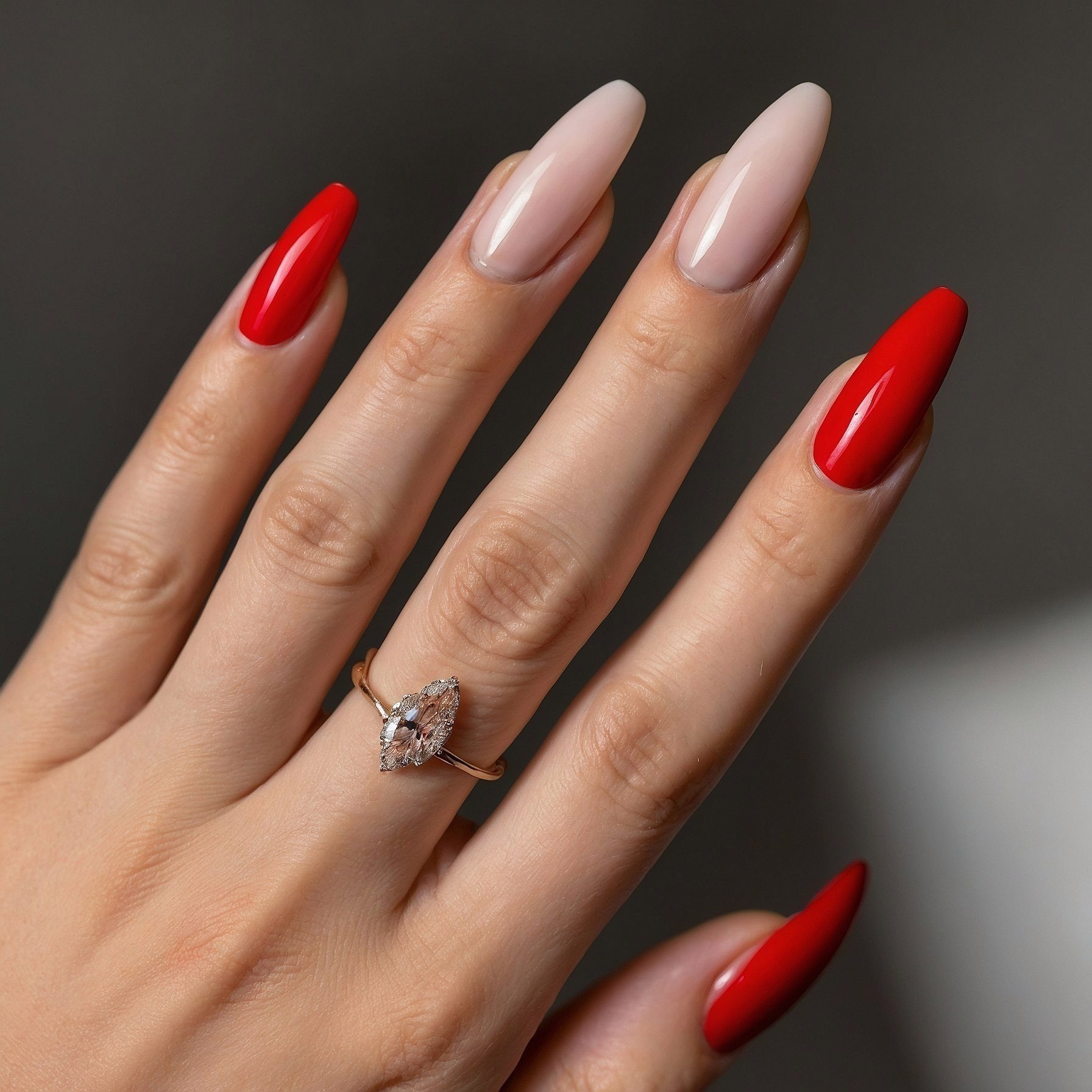 Almond Nails: A Study in Bold Red and Soft Nude