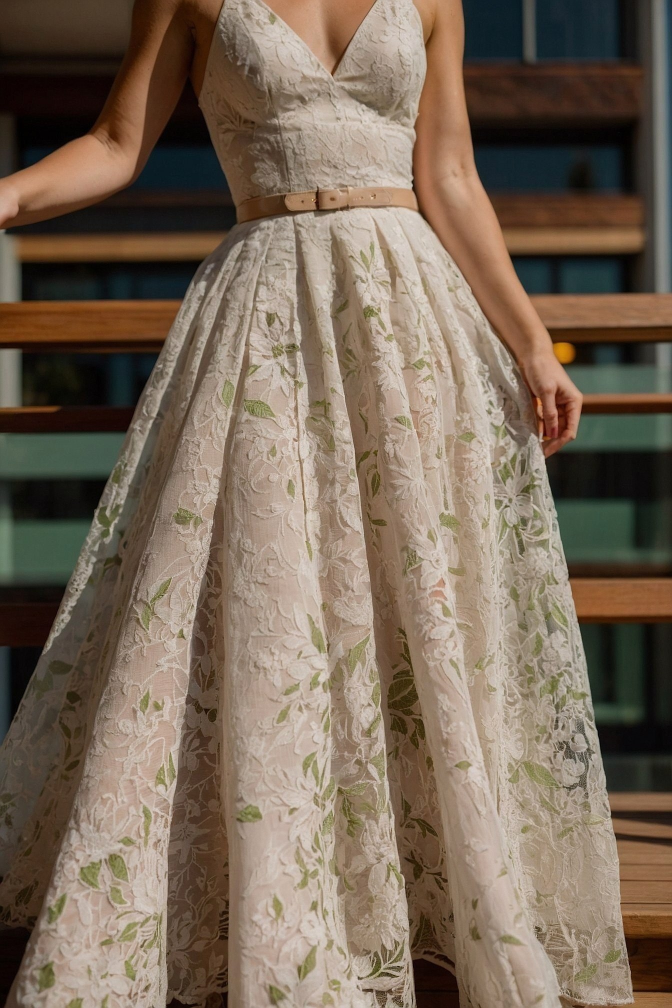 Airy lace overlay with delicate green blooms
