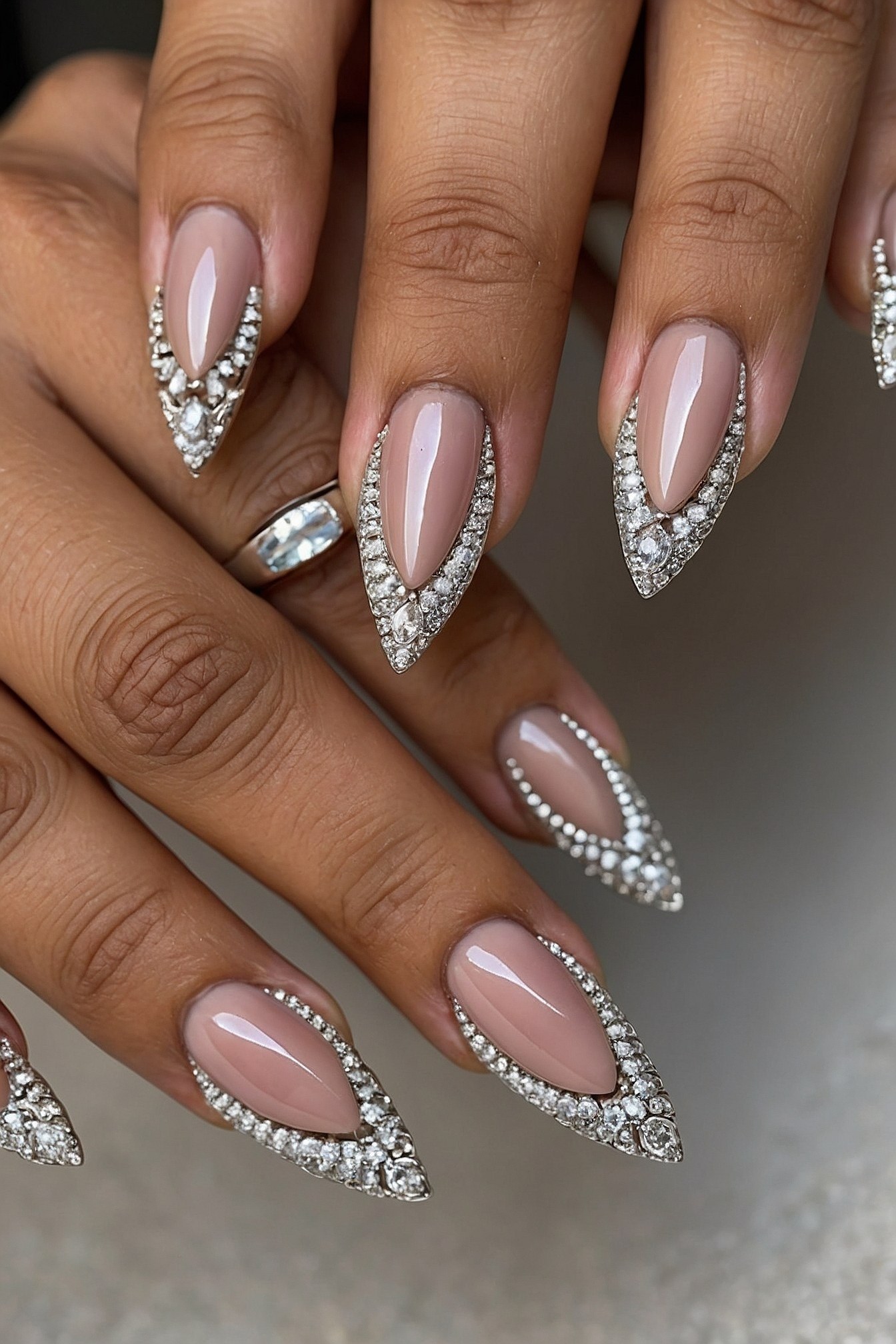 Nails with Crystal Accents and Milky Polish
