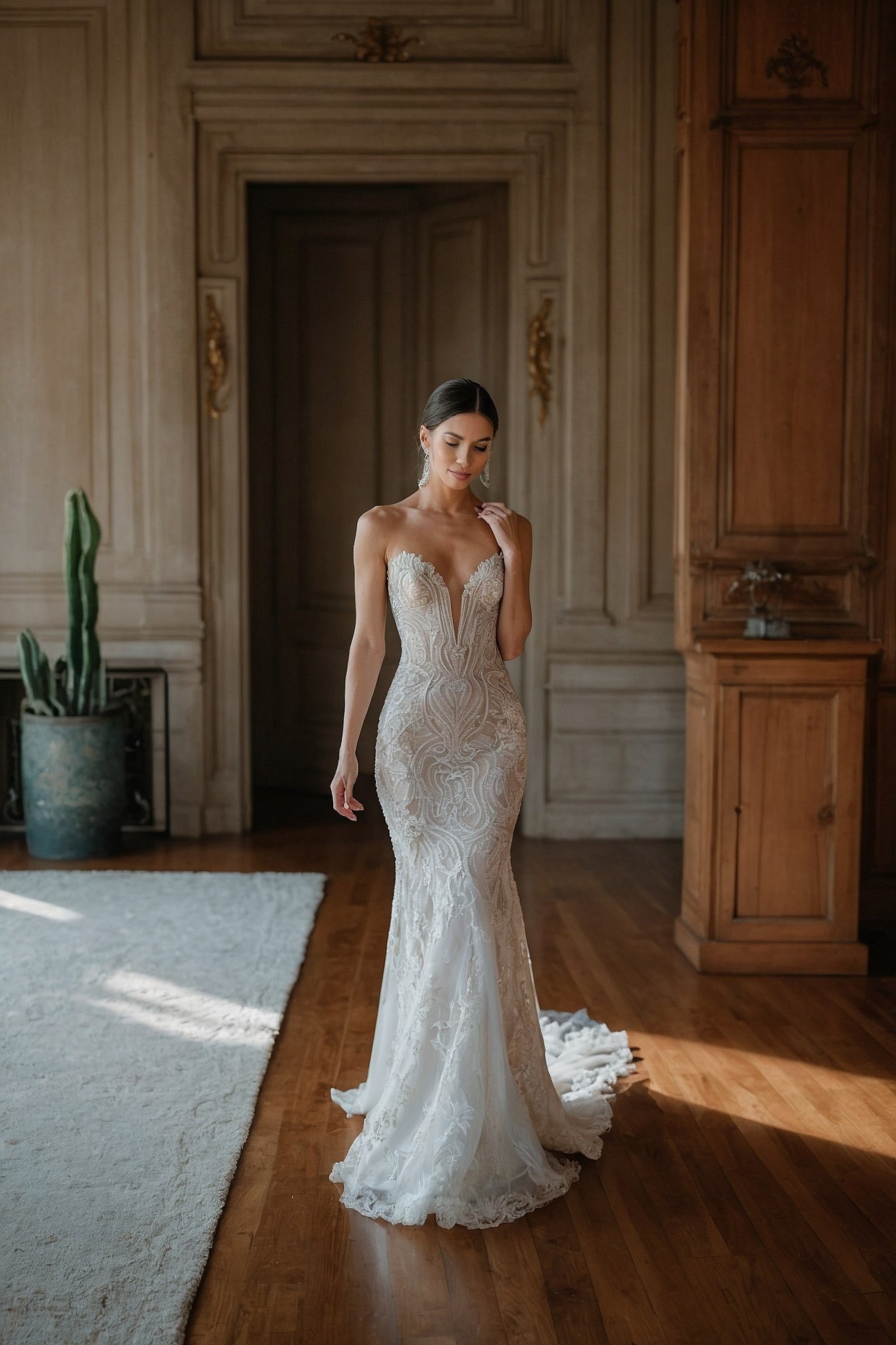 Intricate lace patterns cascading down a mermaid silhouette