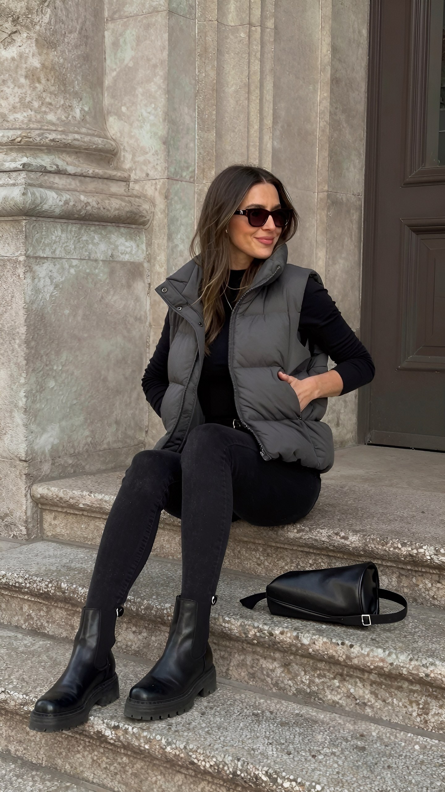 Styling A Grey Puffer Vest With Black Basics
