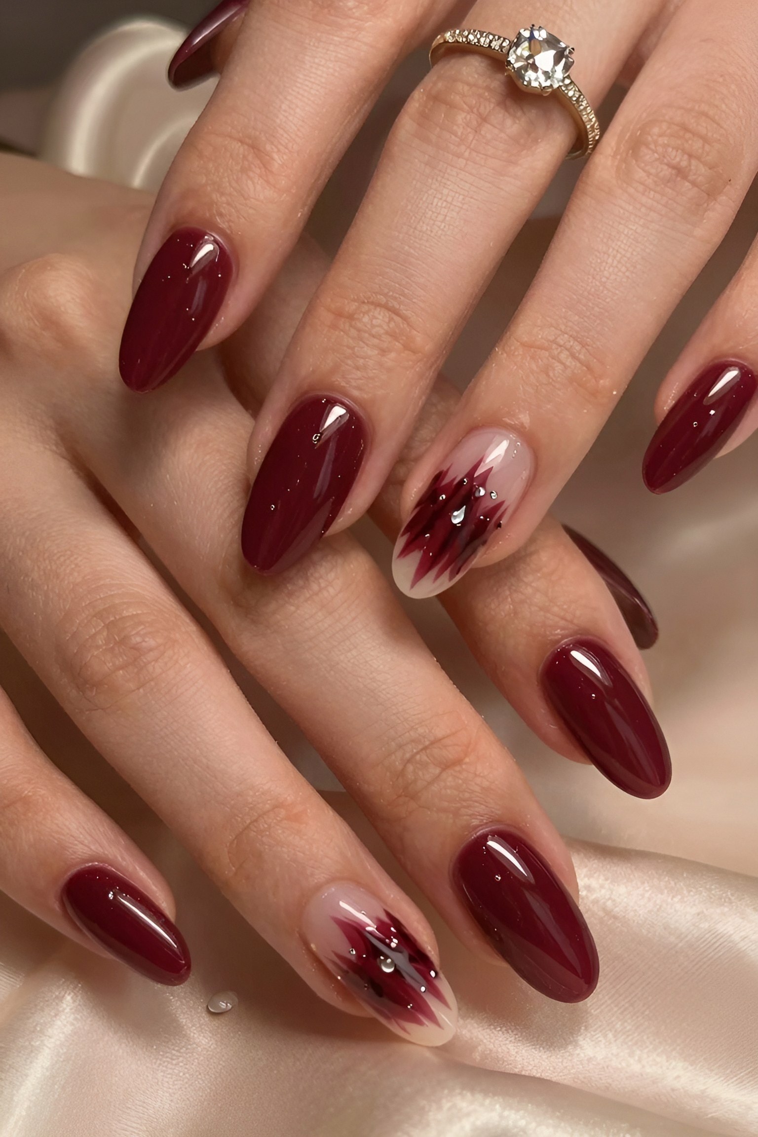 Deep Red Nails with Creative Accent Nails