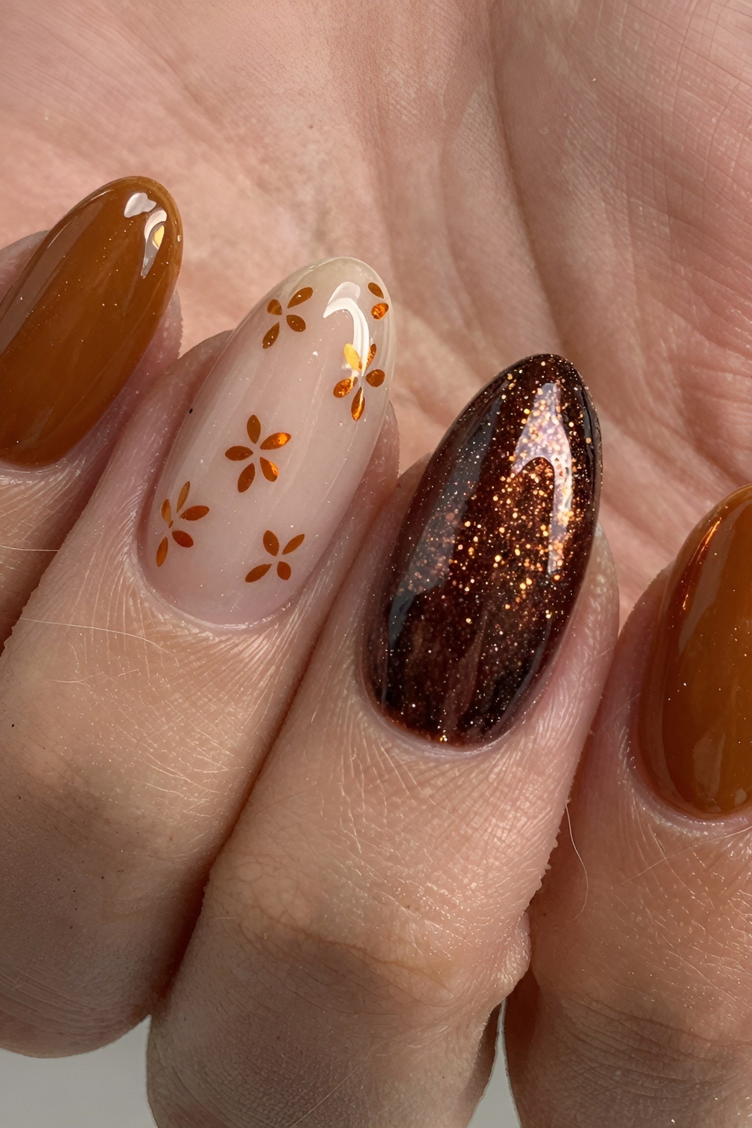 Amber Nail Art With Delicate Fall Floral Accents