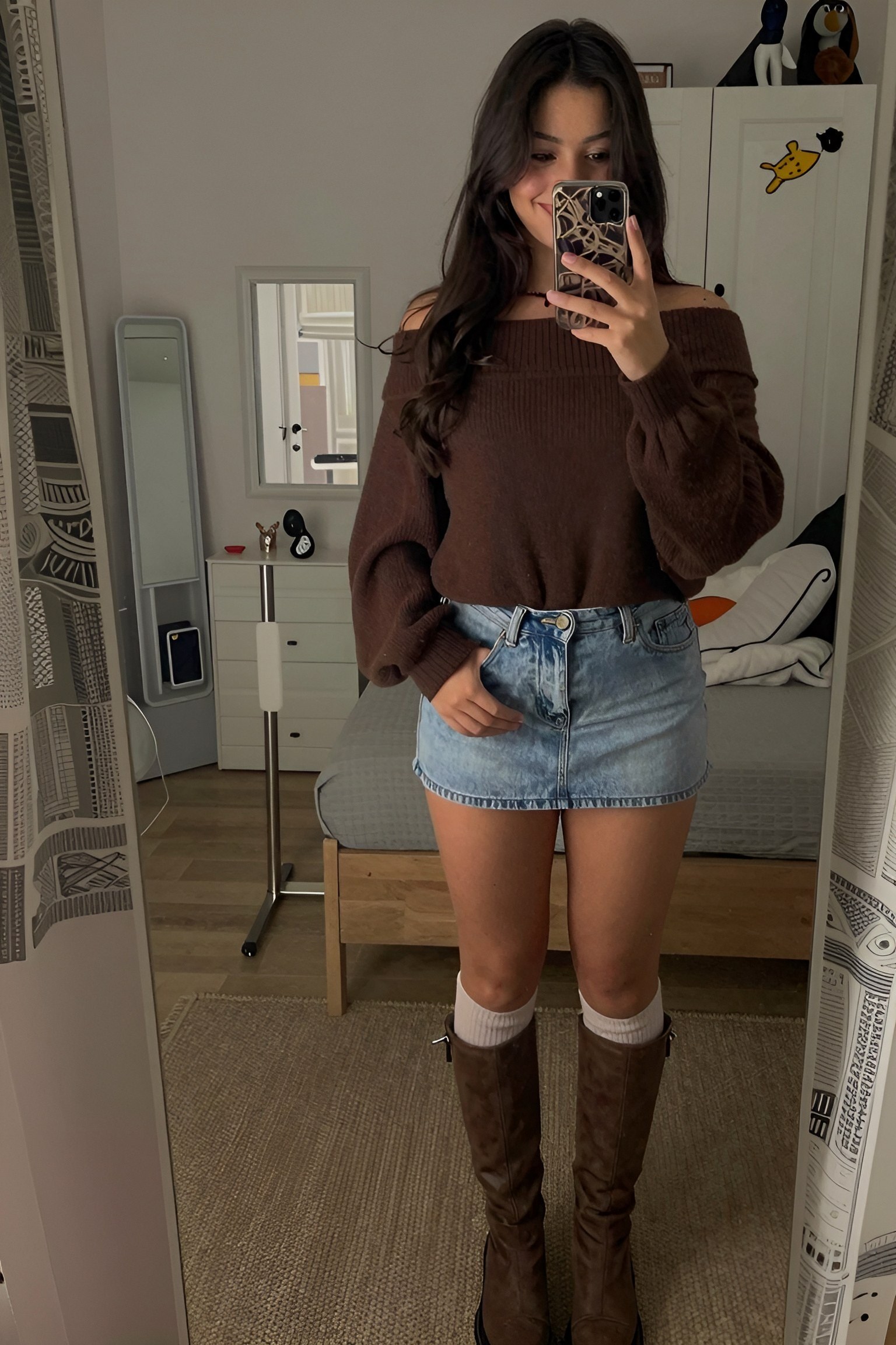 Pairing an Off-the-Shoulder Sweater with a Denim Mini Skirt