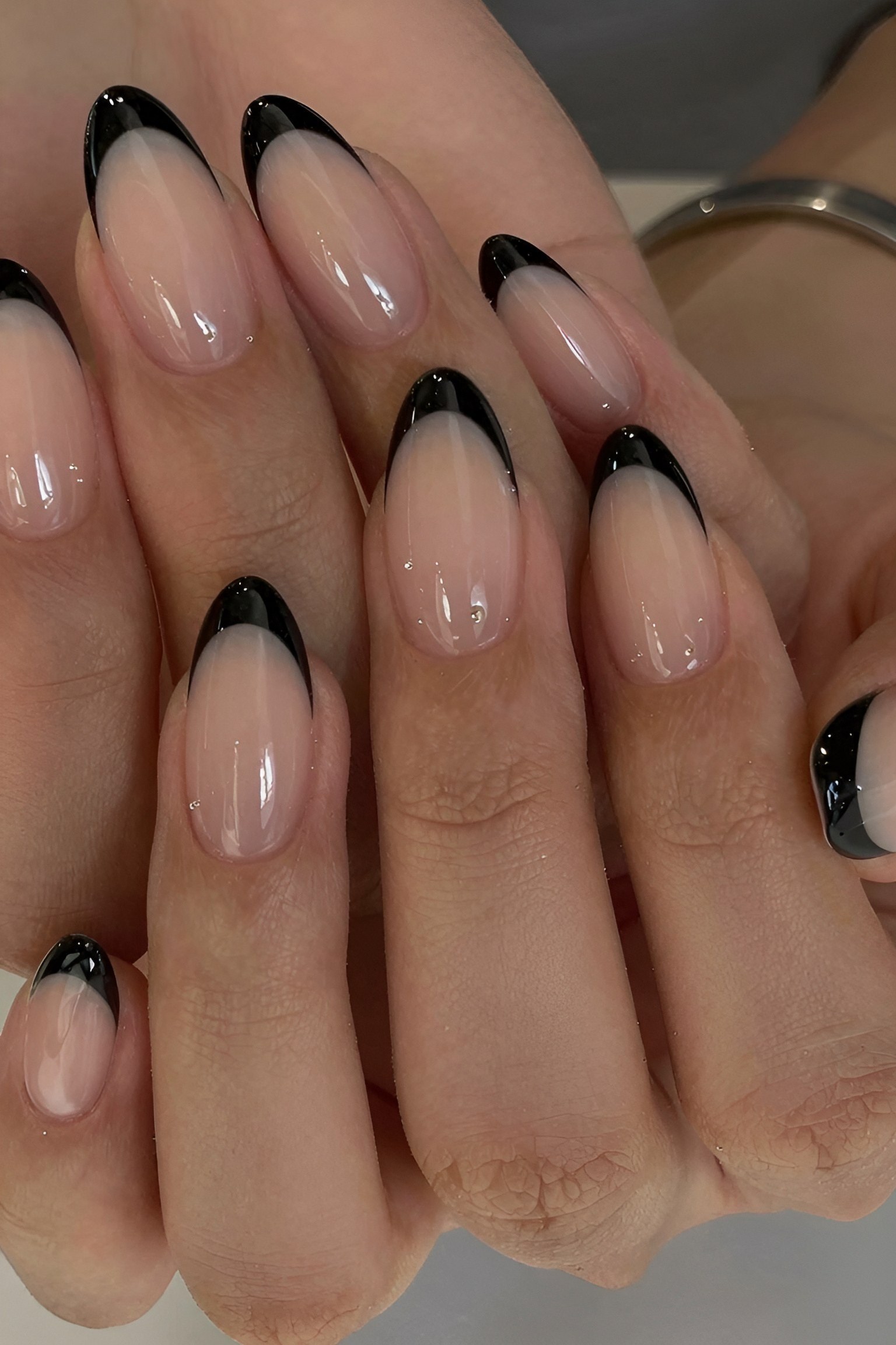 Clean Almond Shaped Nails with Minimal Black Tips