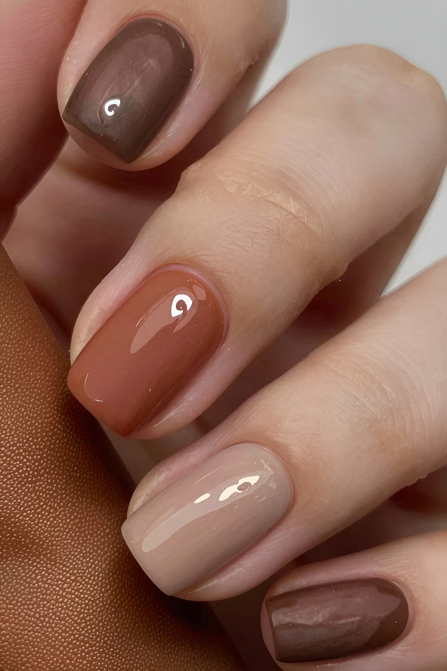 Subtle Brown Gradient Nails with Metallic Flakes