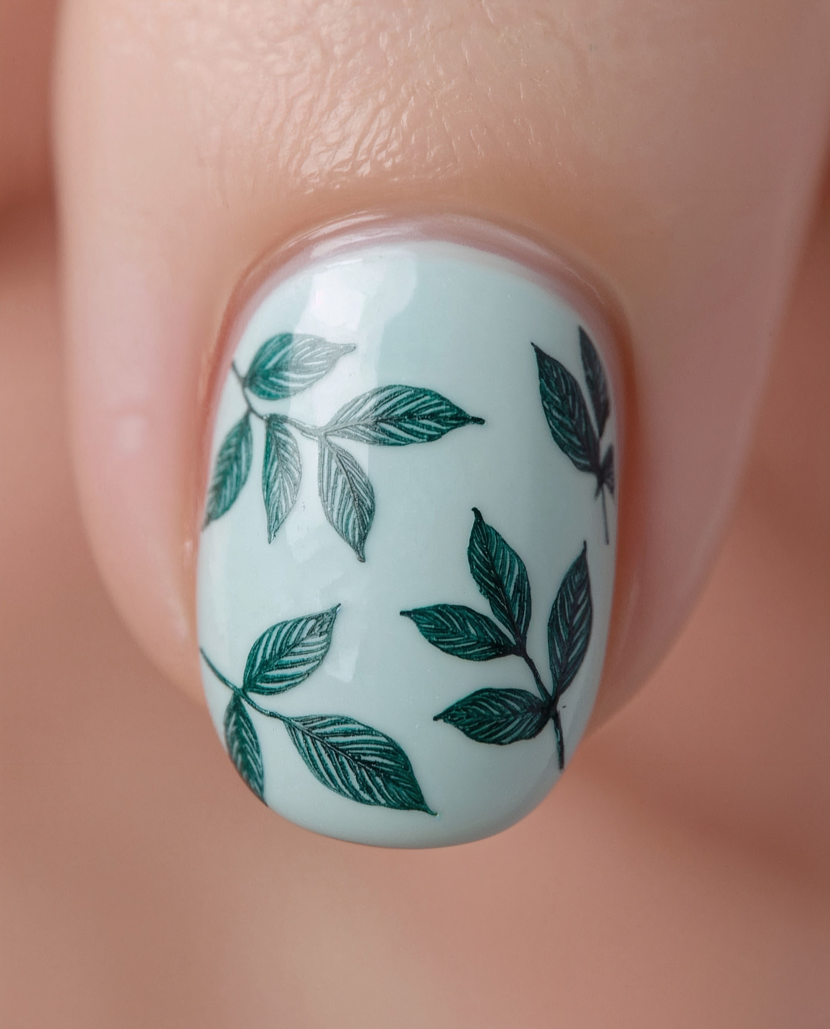 Close-Up Charm: Intricate Details of Blue Leaf Nails