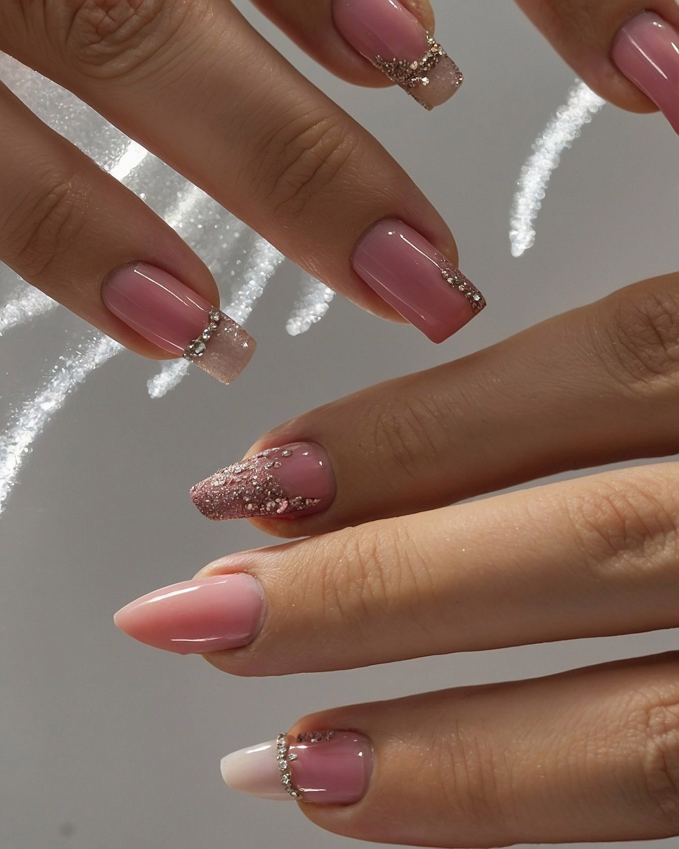 Close-up of delicately adorned almond-shaped nails