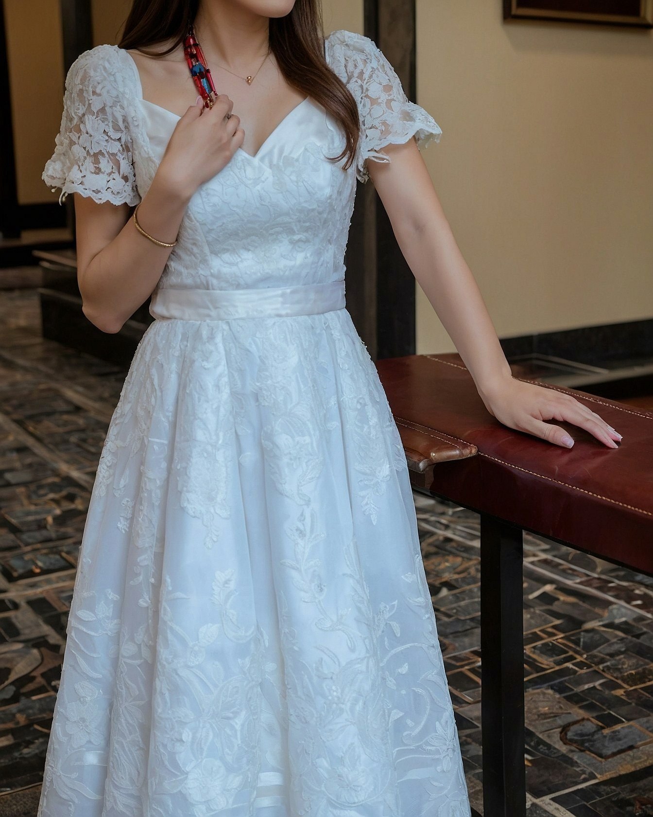 A Gown's Intricate Details and Sculpted Silhouette