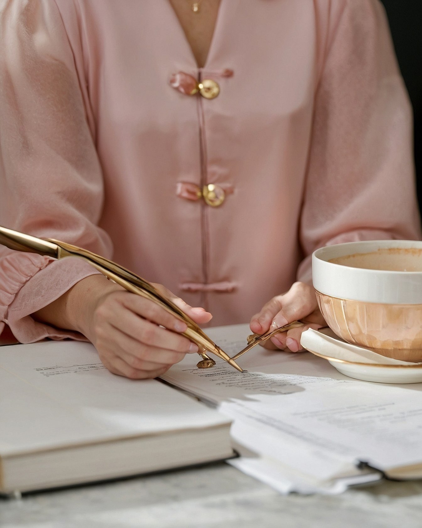 Gentle pink mandarin collar and writer's tools