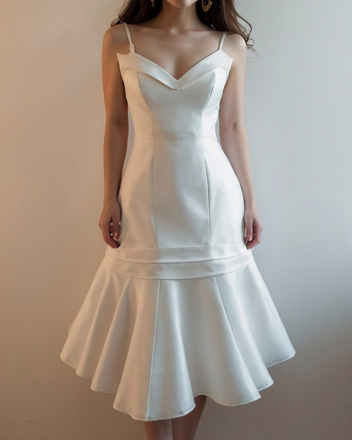 A white dress with architectural flair