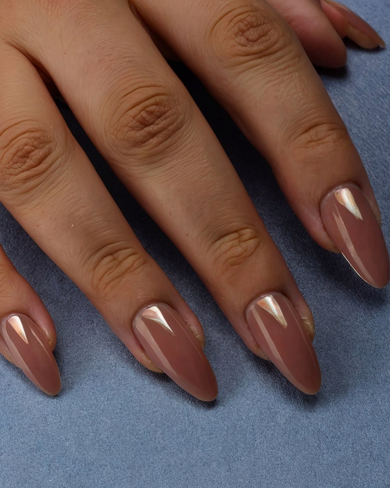 Close-up of Almond Nails with Pearlescent French Tips