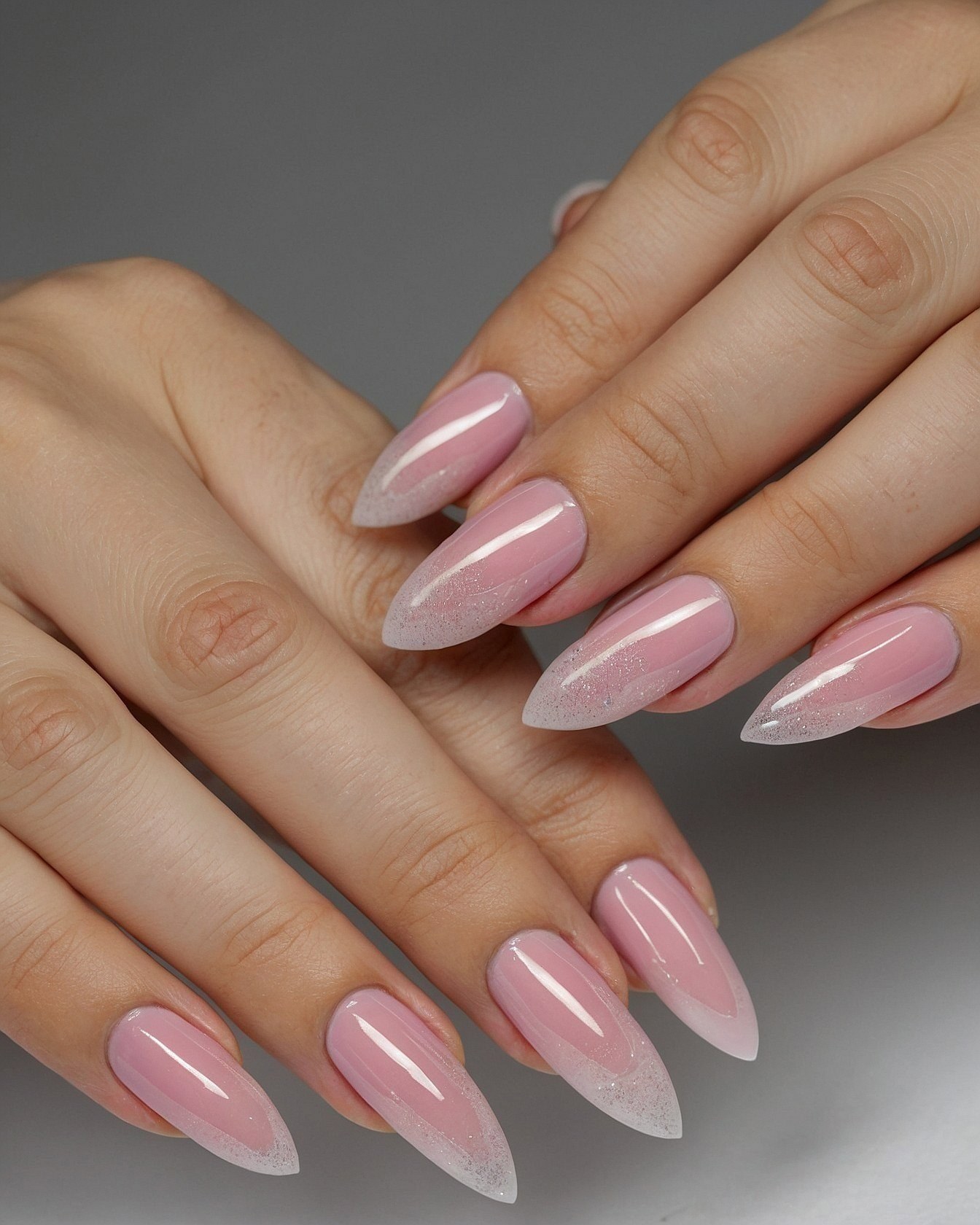 Soft Pink French Tips with a Glitter Ombre