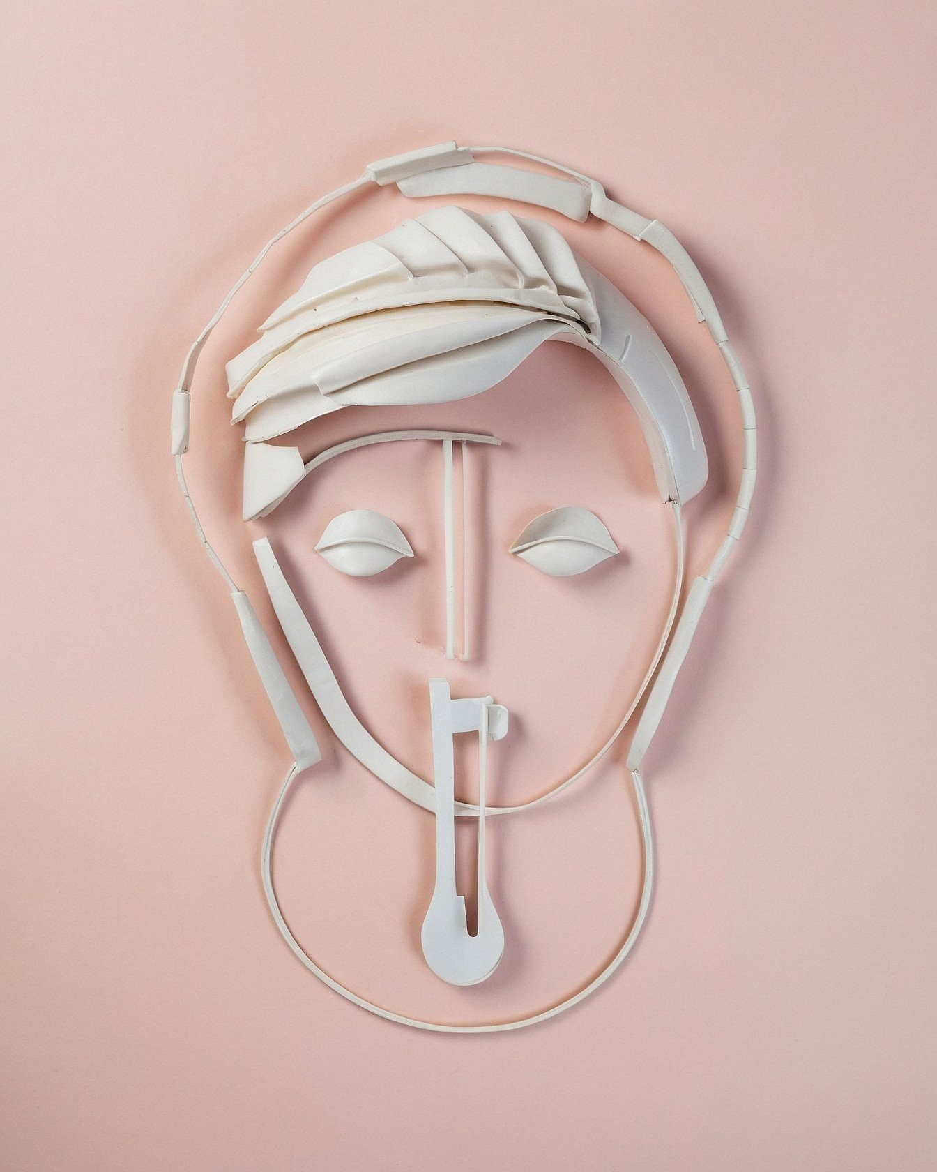 Abstract White Profile Against Subtle Pink Backdrop