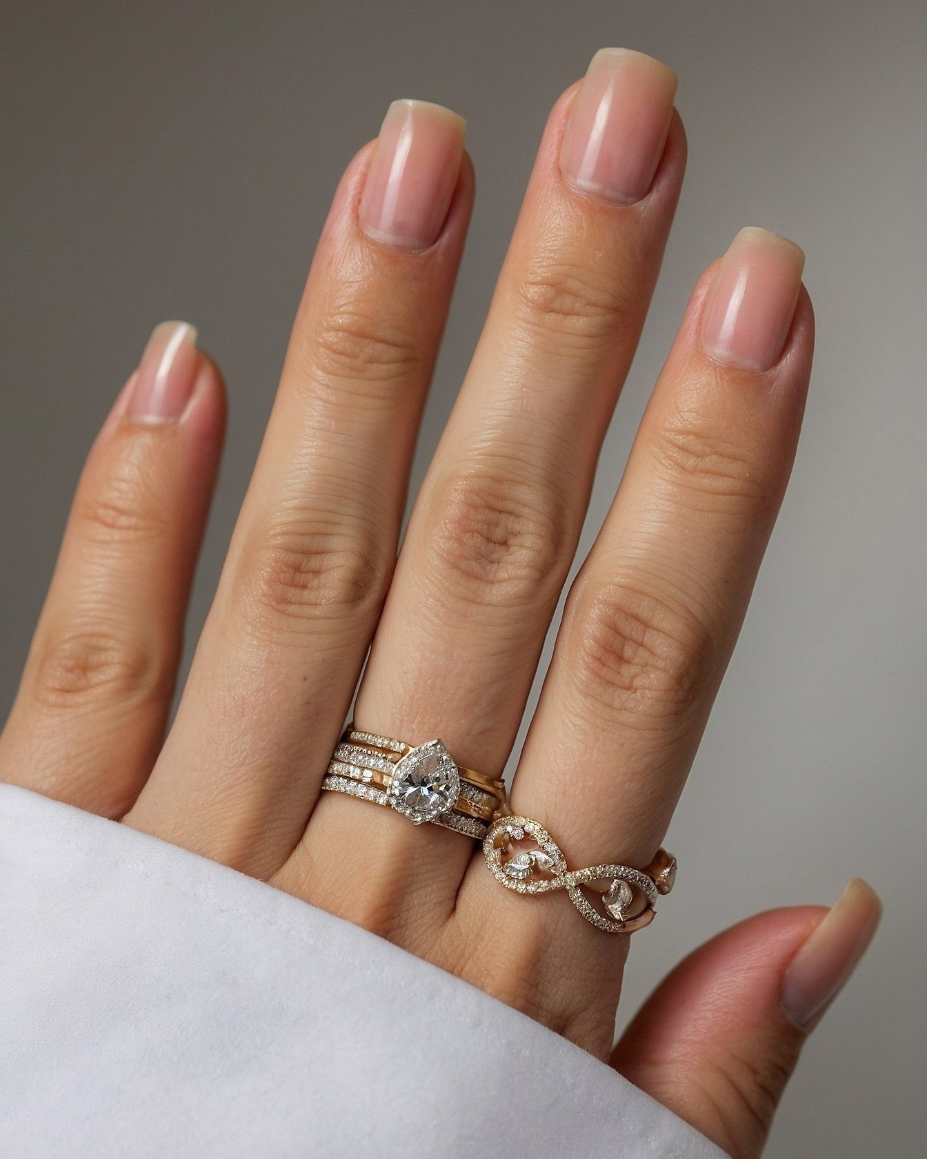Subtle Nails with Stacked Diamond Rings