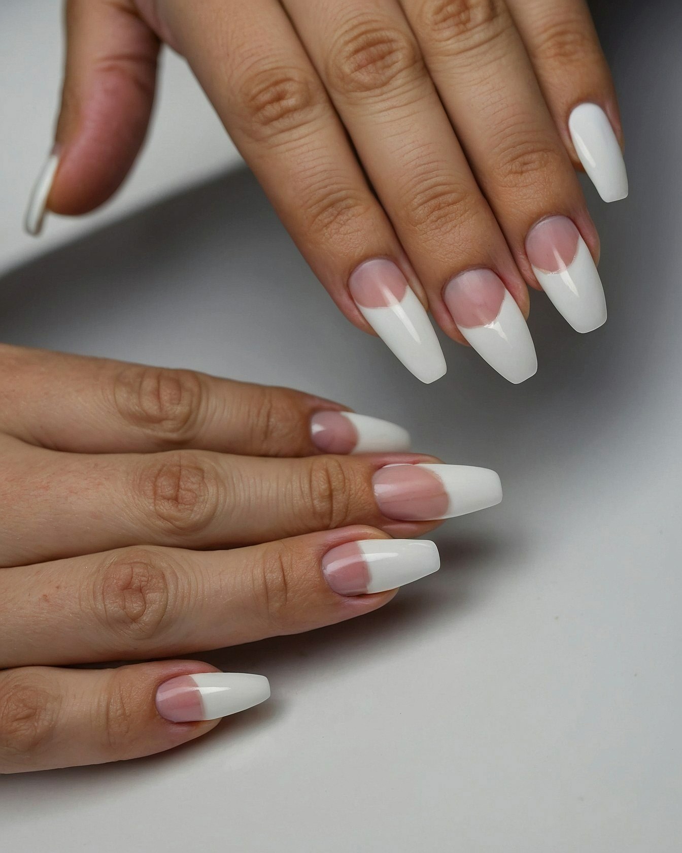 Modern French Tips with a Subtle Curve