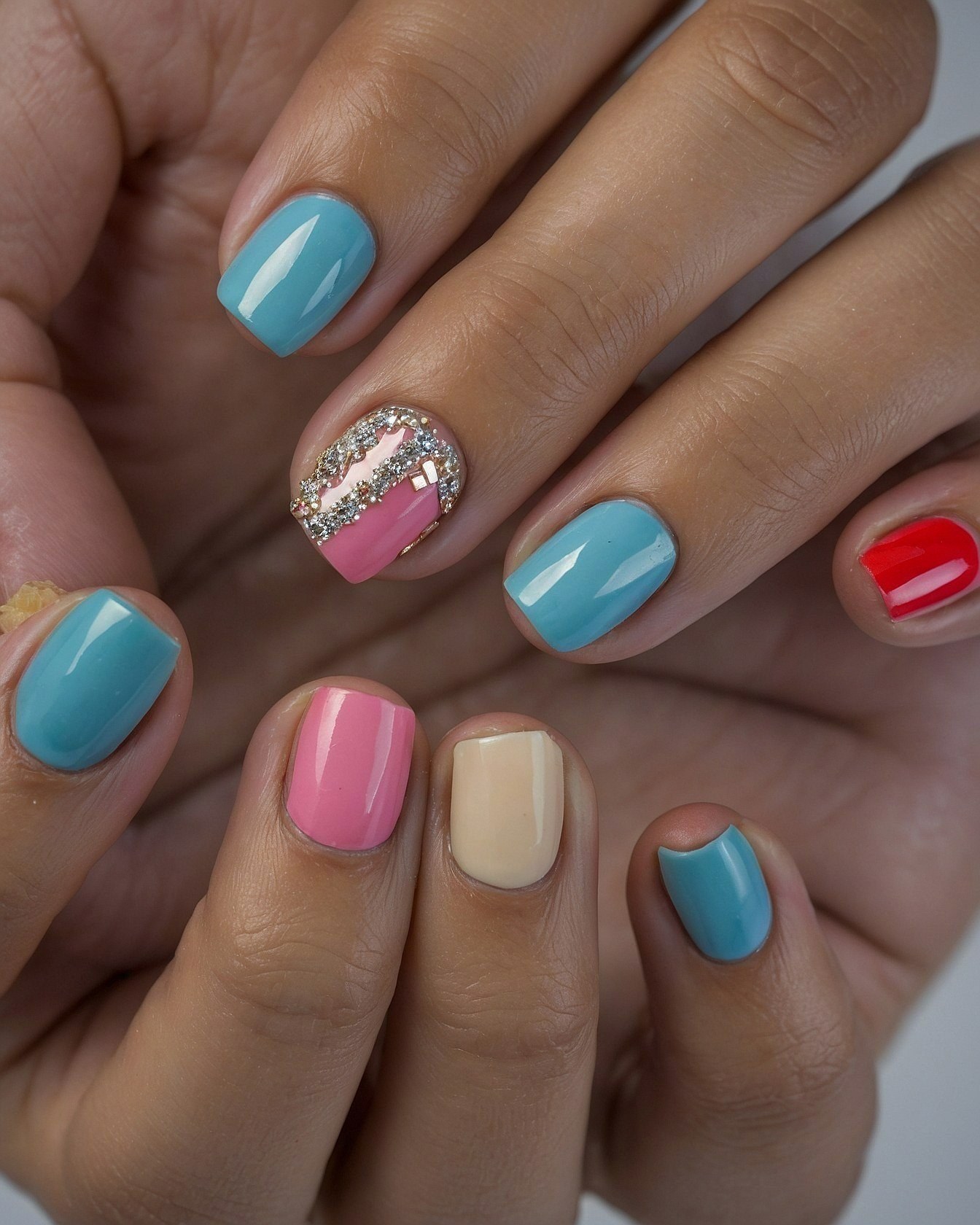 Varying Hues and a Single Embellished Nail