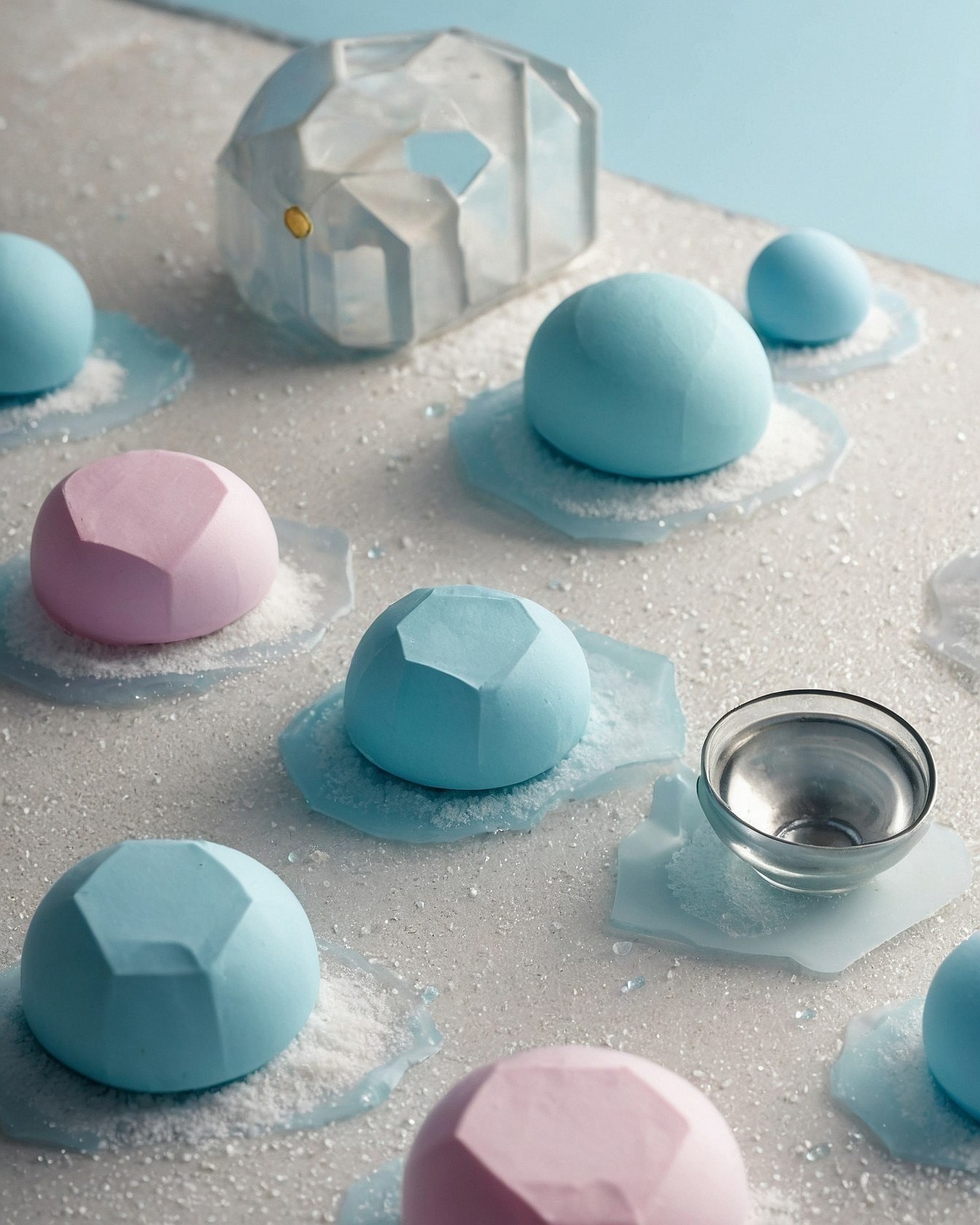Geometric Pastel Spheres on a Frosted Surface
