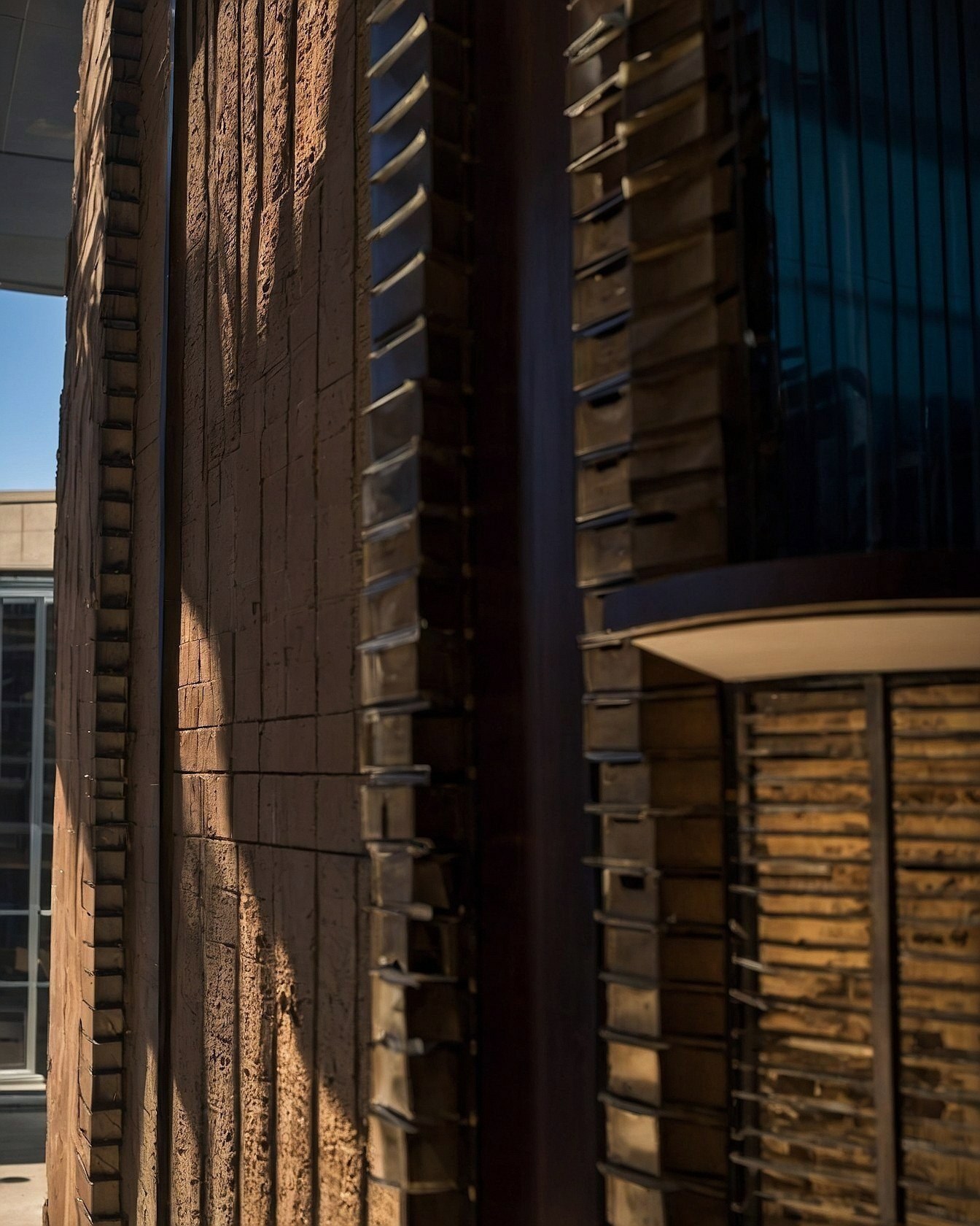 Textured Brick and Glass Facade Play of Light