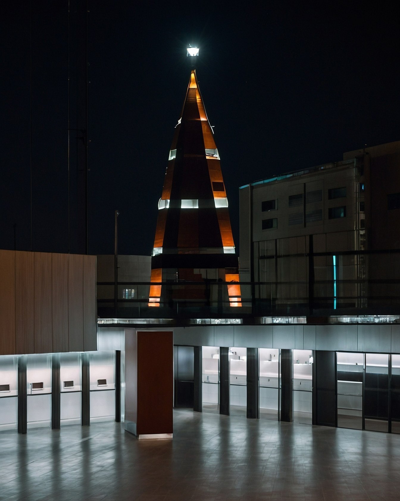 Pyramid Tower at Night with Warm Illumination