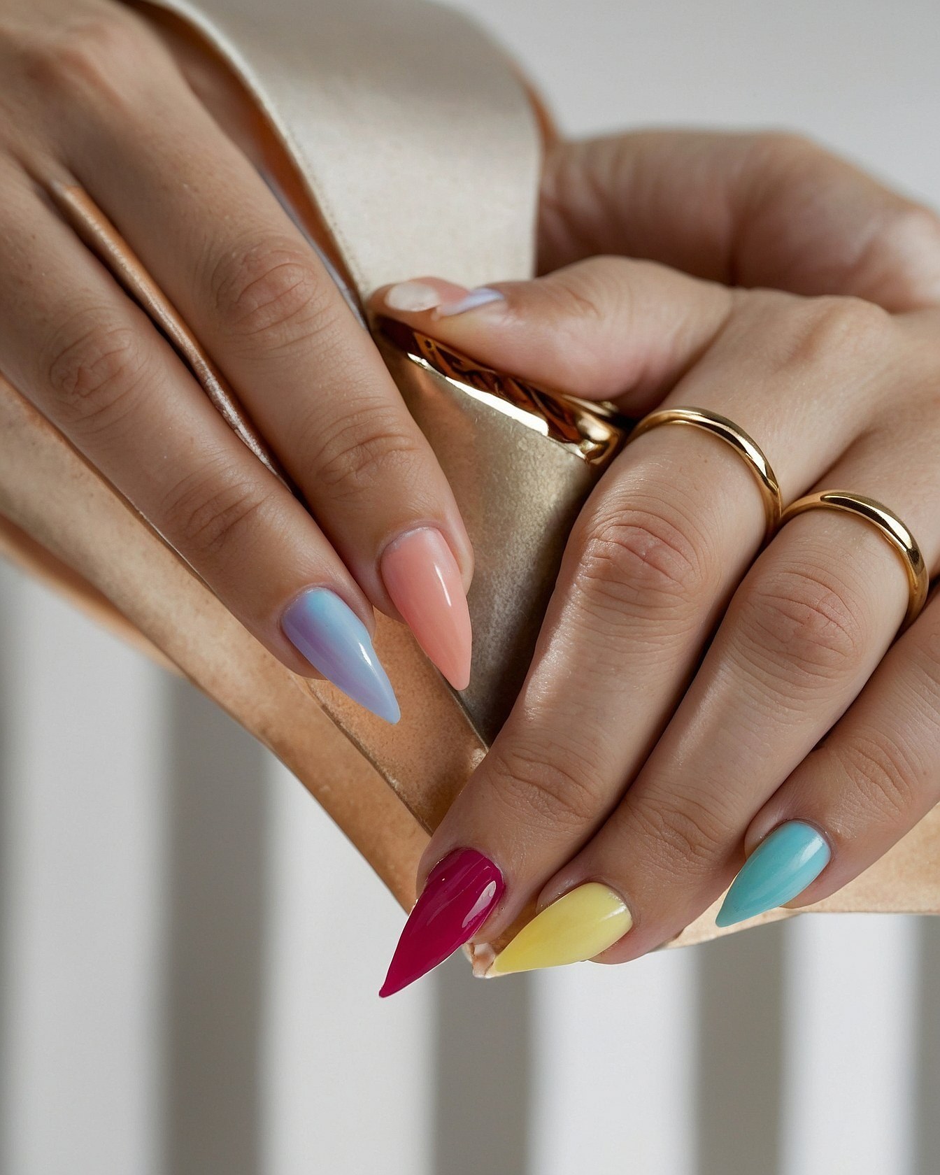 What's Behind the Multicolored Almond Nails?